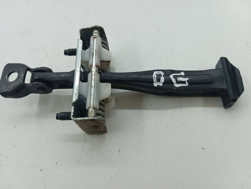 Rear door check strap stopper – right