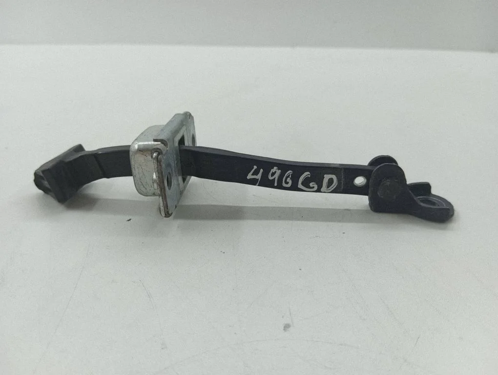 Rear door check strap stopper – right