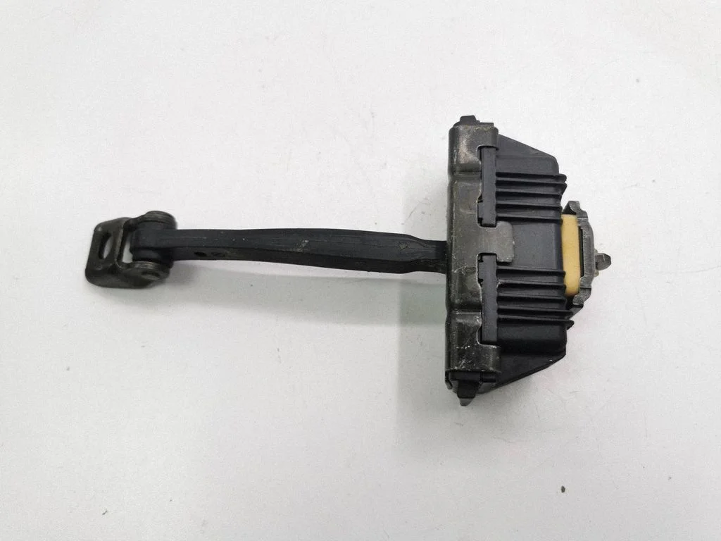 Rear door check strap stopper 7033612