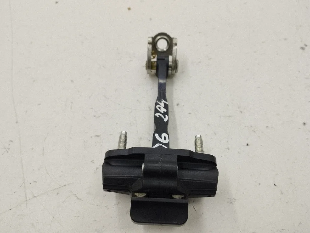 Rear door check strap stopper – right