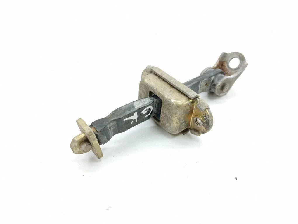 Rear door check strap stopper – left