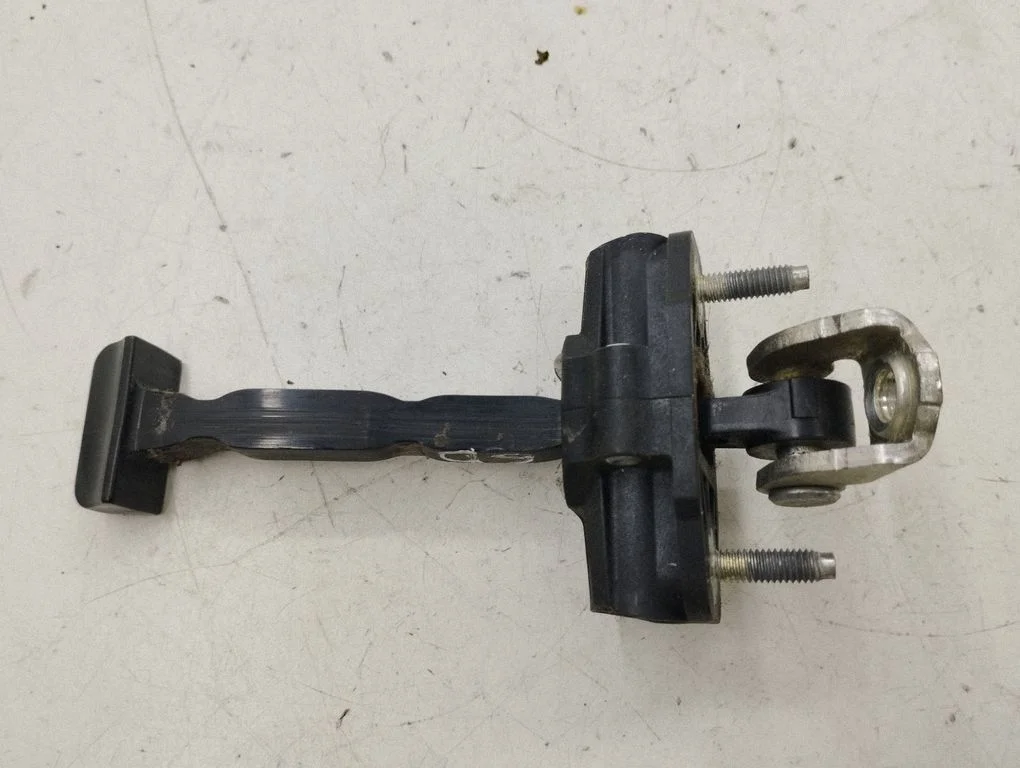 Rear door check strap stopper – right