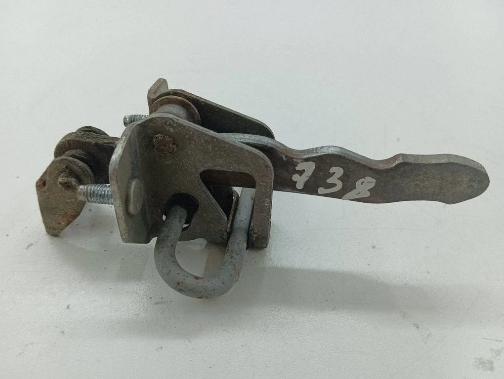 Rear door check strap stopper – right