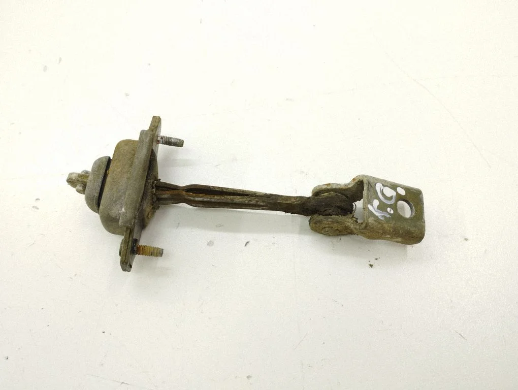 Rear door check strap stopper – rear left