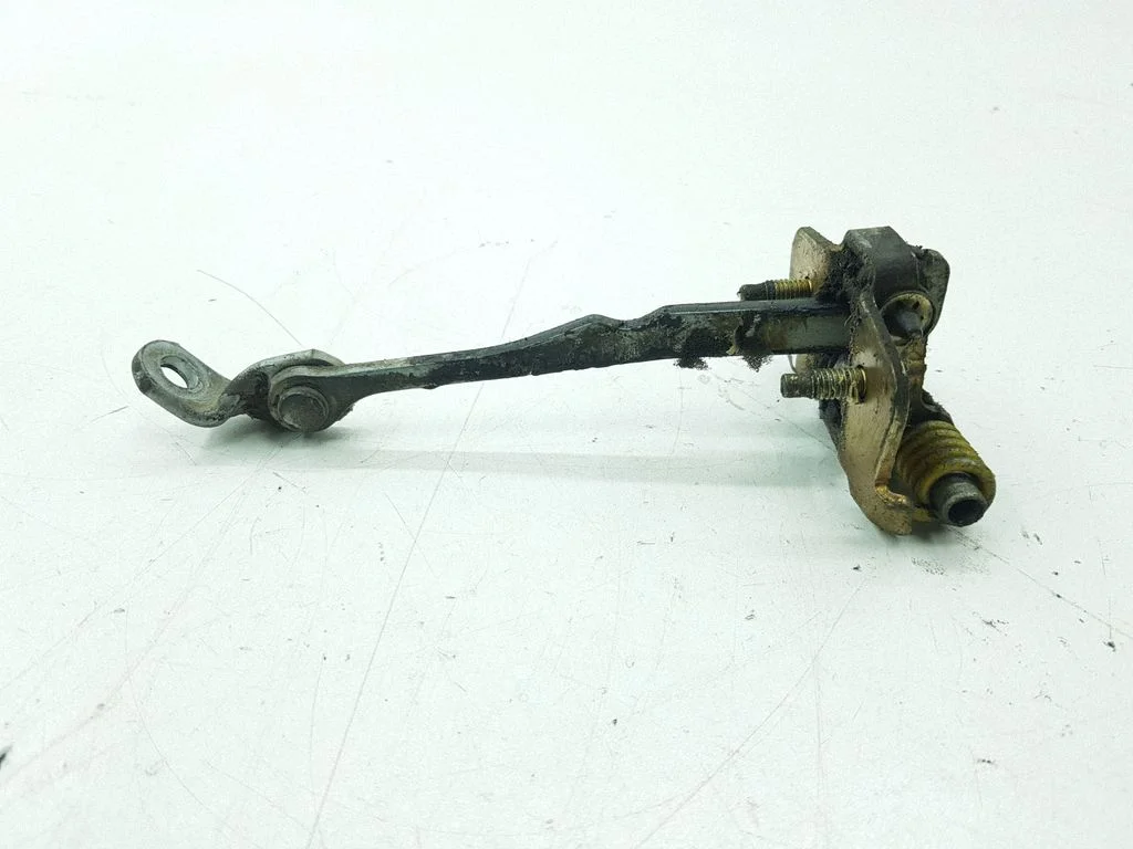 Rear door check strap stopper – right