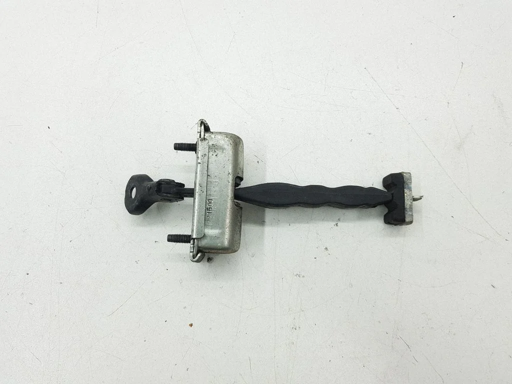 Rear door check strap stopper DS73F27200AD