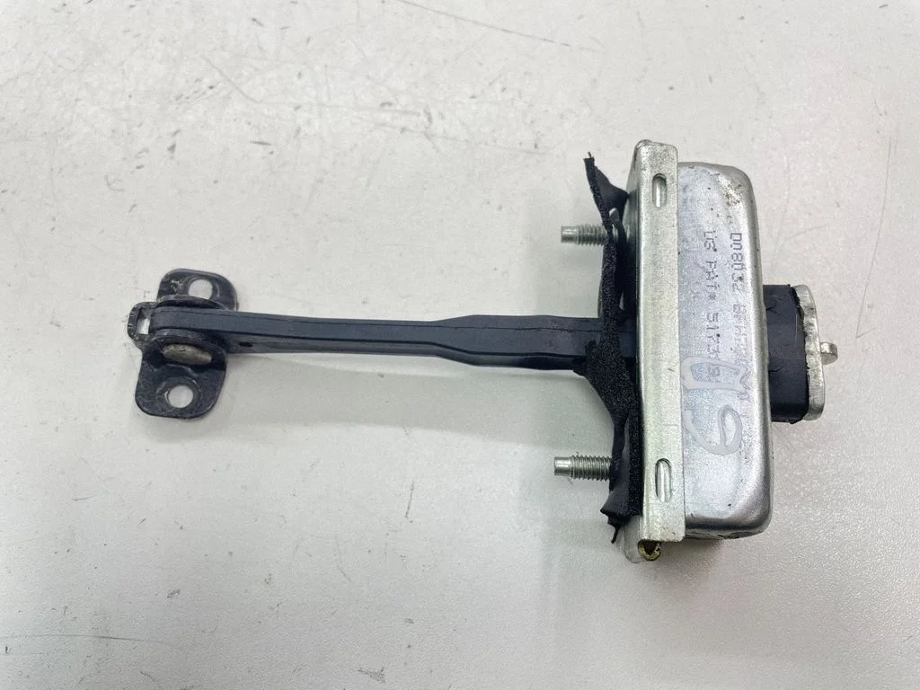 Rear door check strap stopper D08032