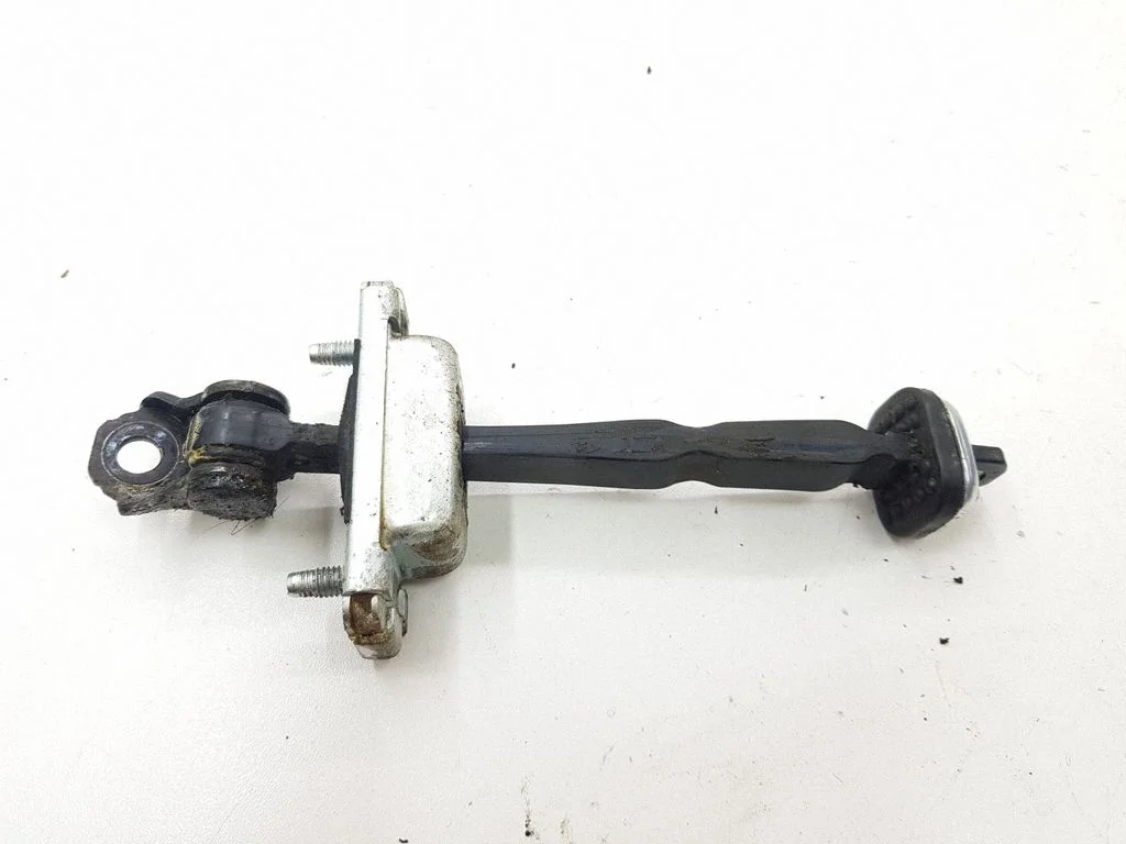 Rear door check strap stopper