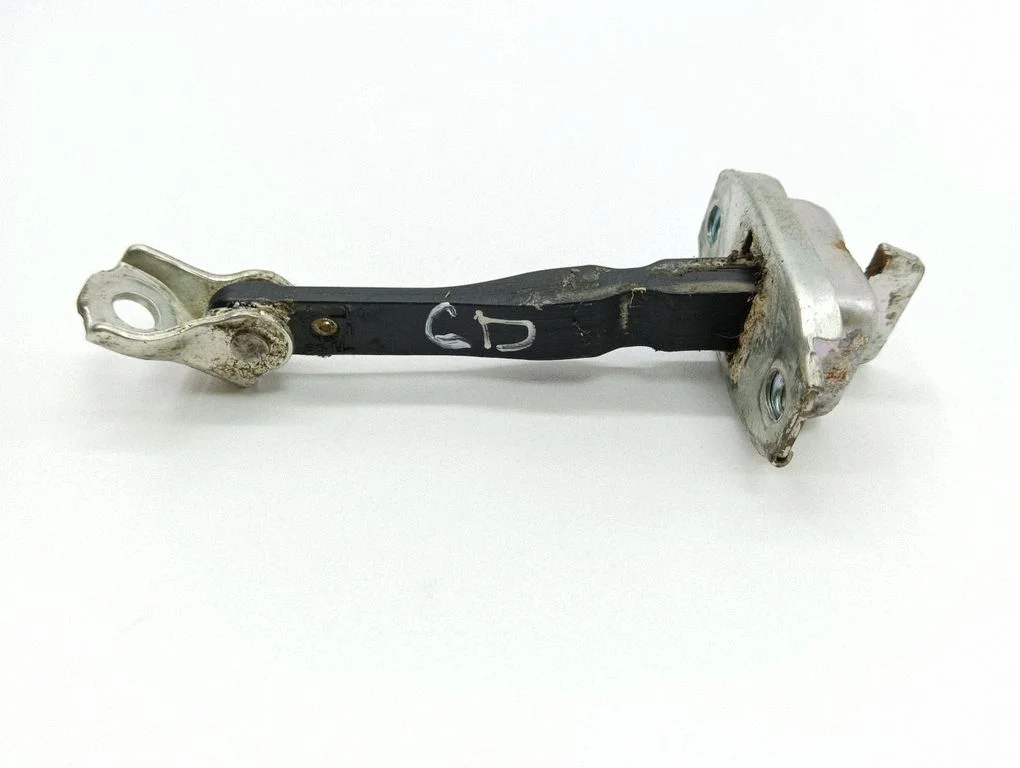 Rear door check strap stopper – rear right