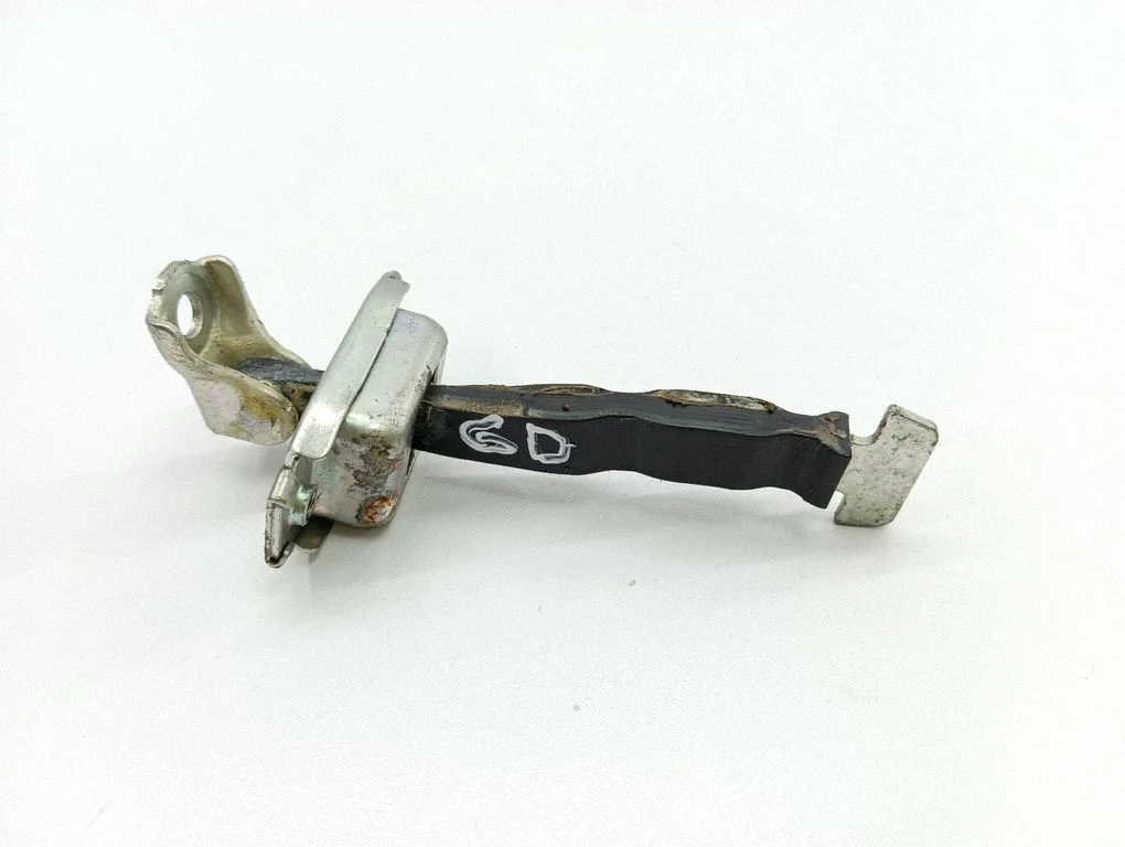 Rear door check strap stopper – rear right