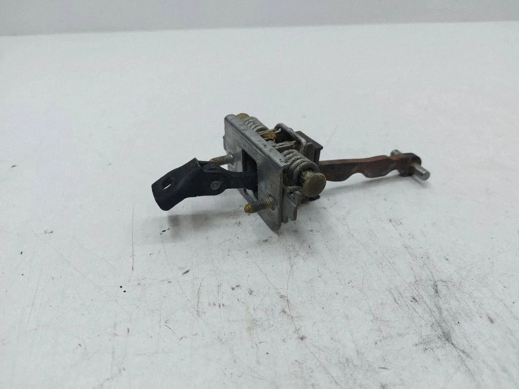 Rear door check strap stopper – right