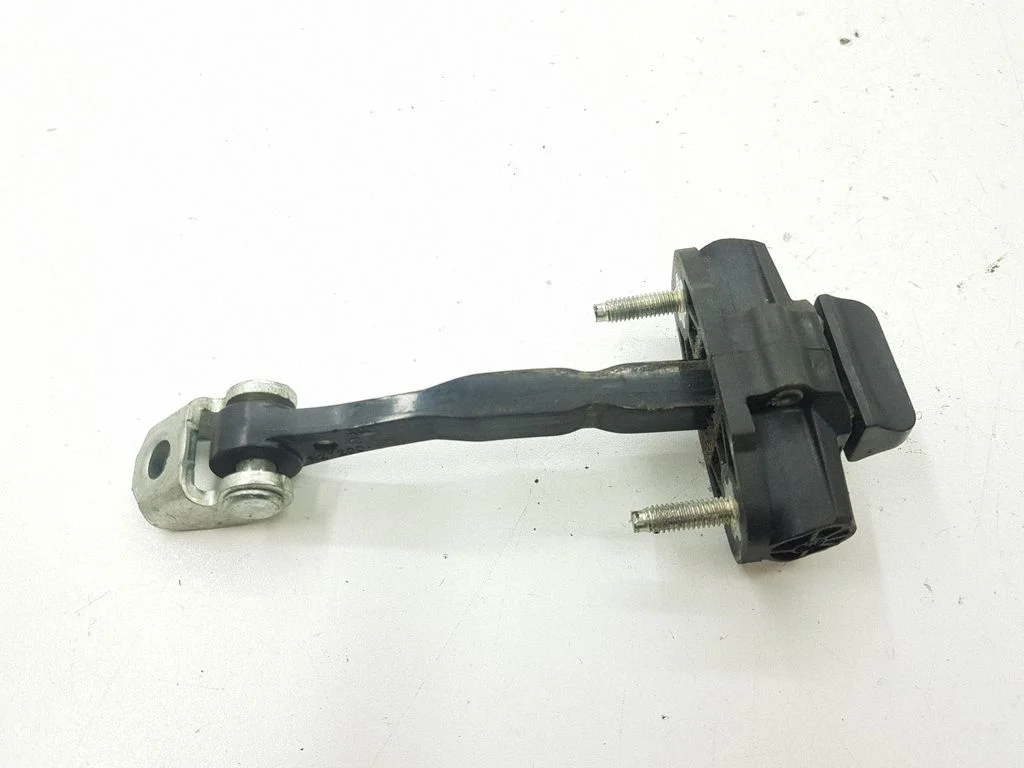 Rear door check strap stopper – rear left