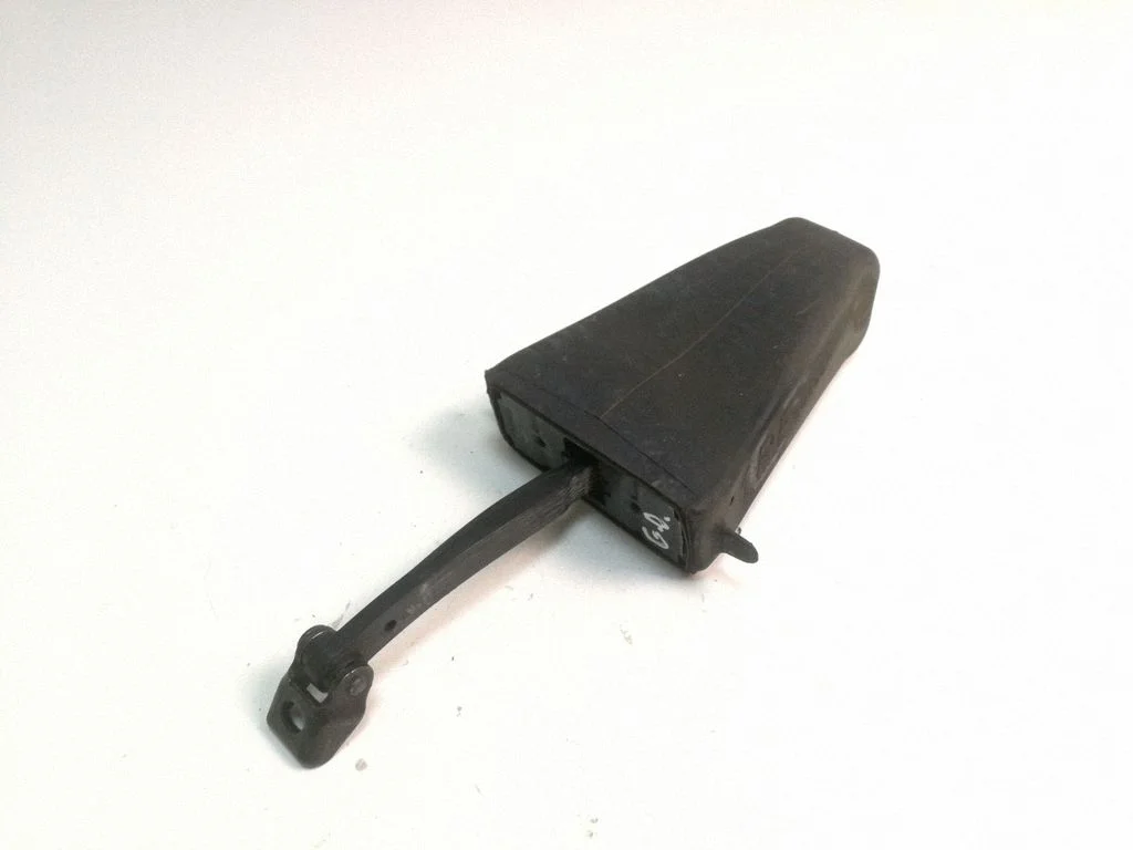 Rear door check strap stopper 7033623