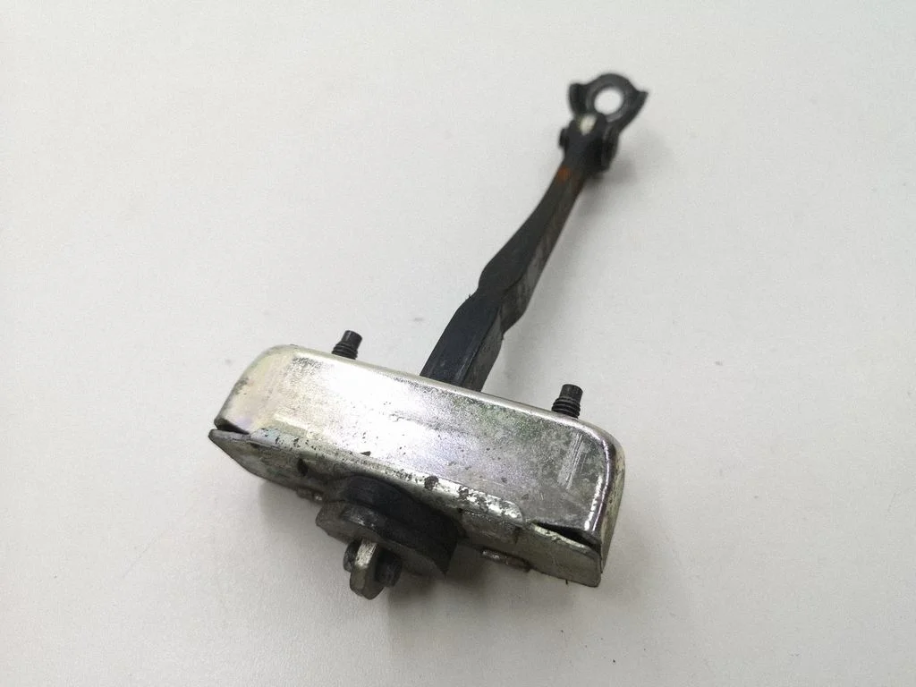 Rear door check strap stopper – right