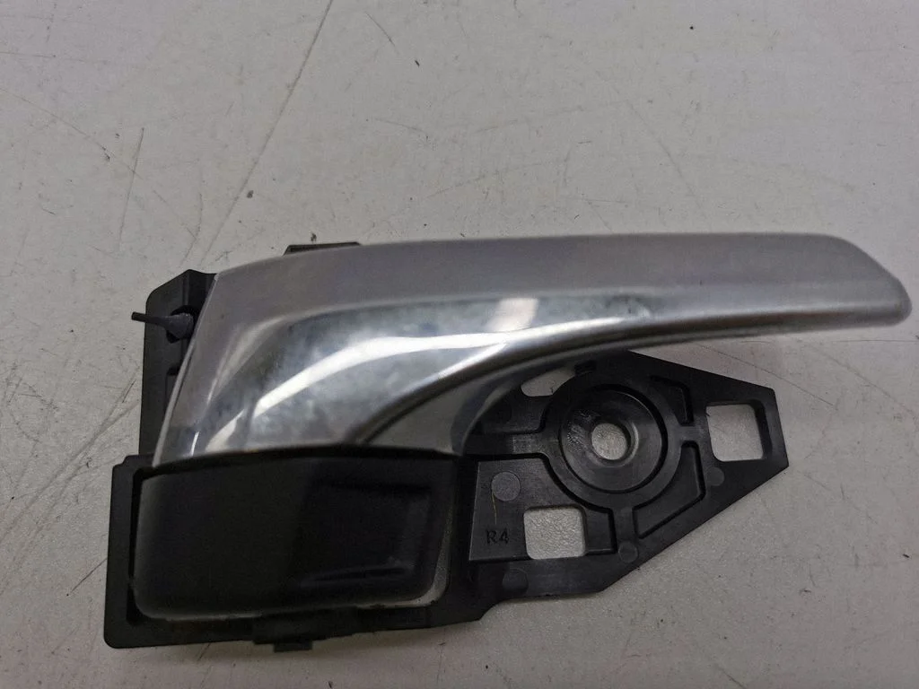 Rear door interior handle – left