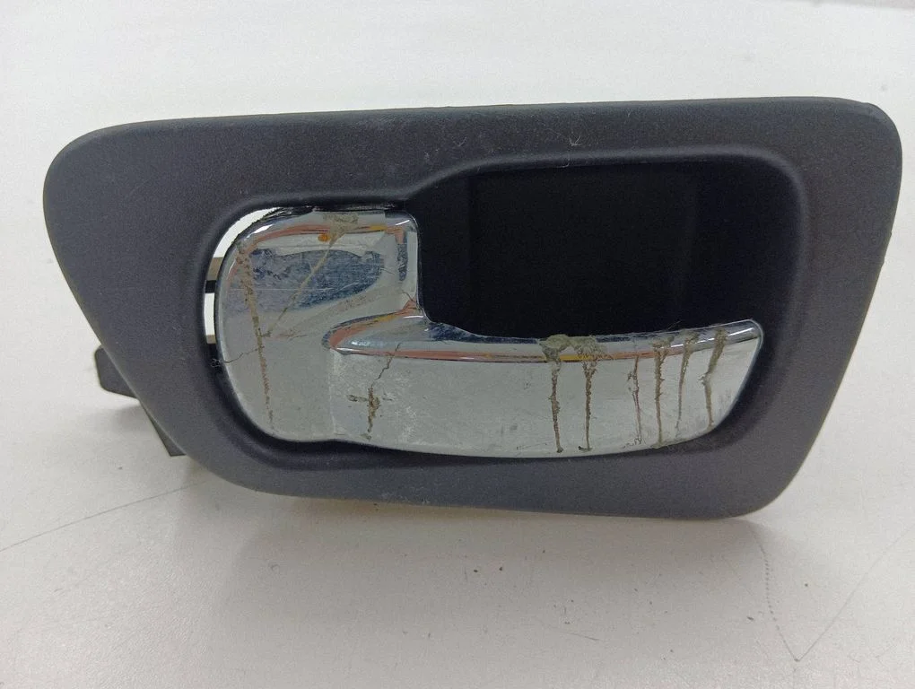 Rear door interior handle – left
