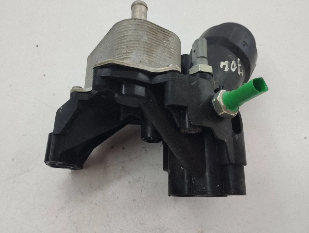 Oil filter mounting bracket 03N117021B