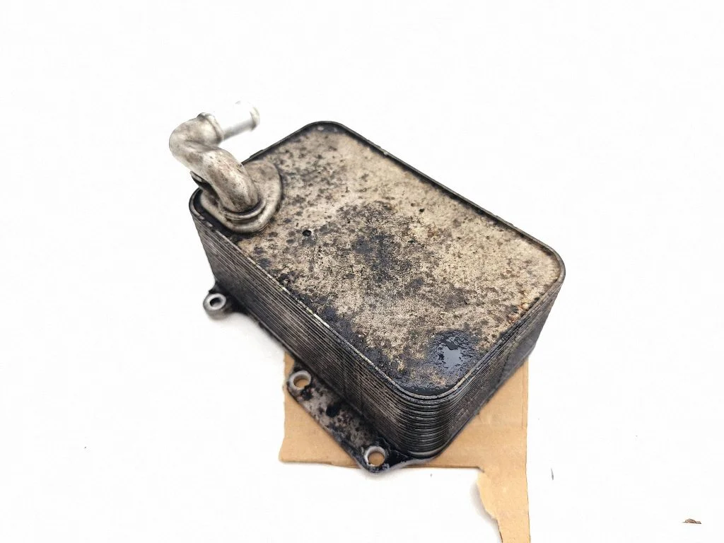 Oil filter mounting bracket 6789630