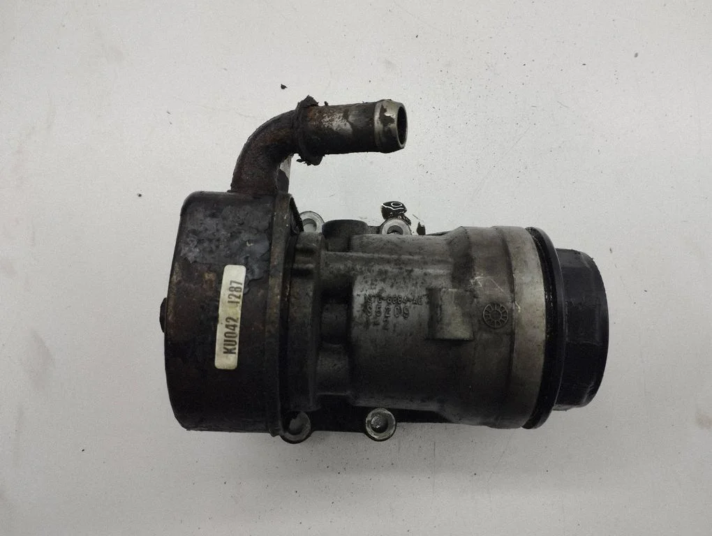 Oil filter mounting bracket 1S7G6884AE