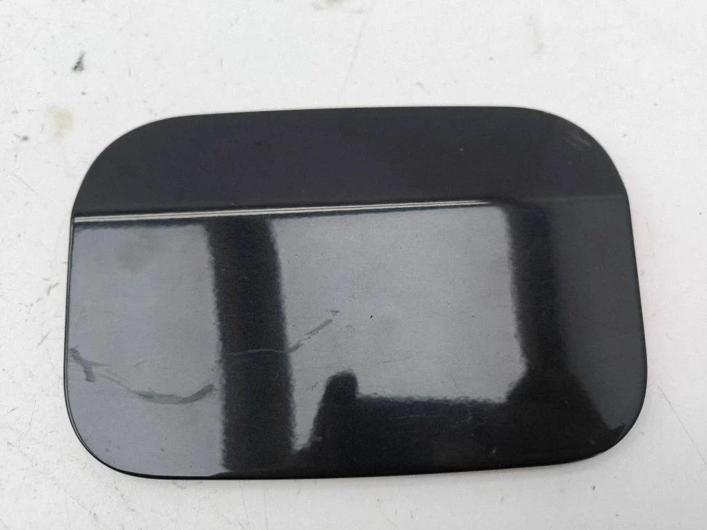 Klapka wlewu paliwa 6955187