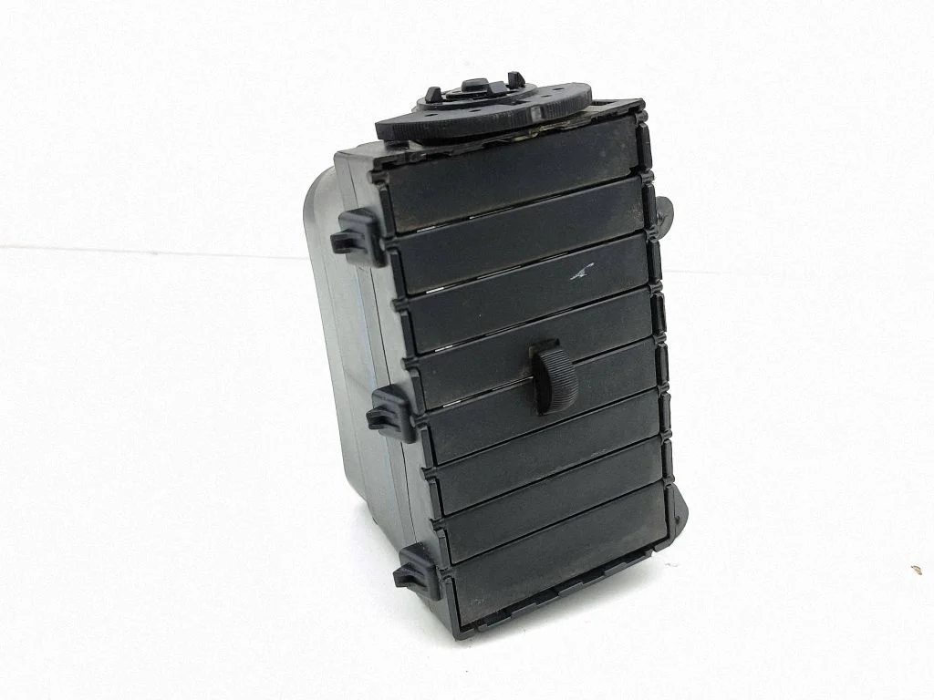 Dash center air vent grill 05028821AA