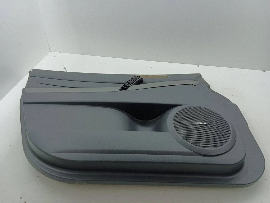 Front door card panel trim EG214531B