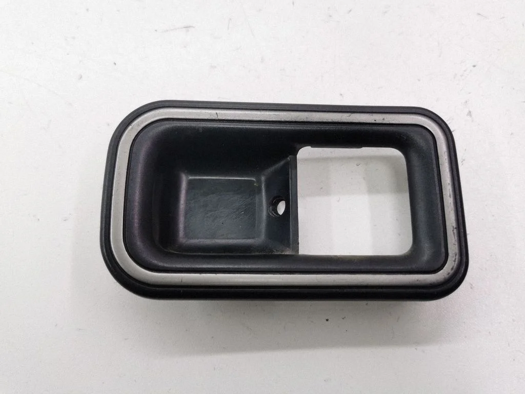 Front door interior handle trim 86GBA266A20AB