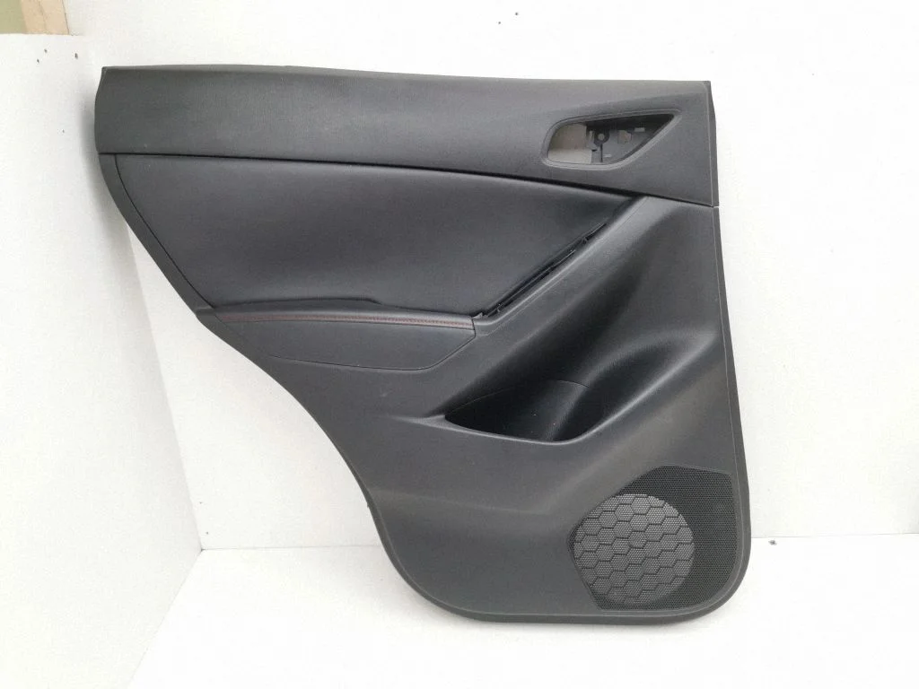 Rear door card panel trim – left