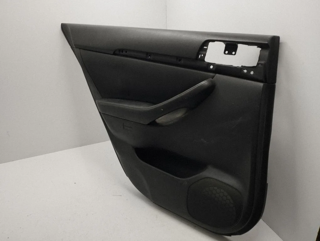Rear door card panel trim – left