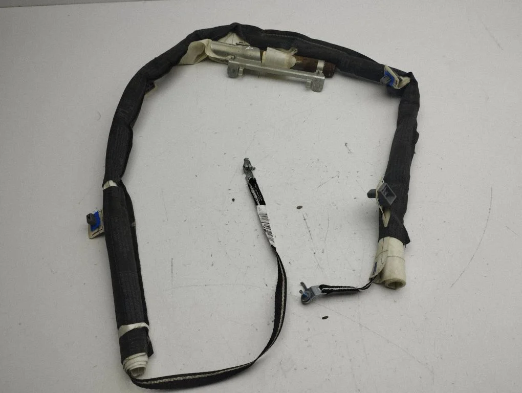 Roof airbag – left