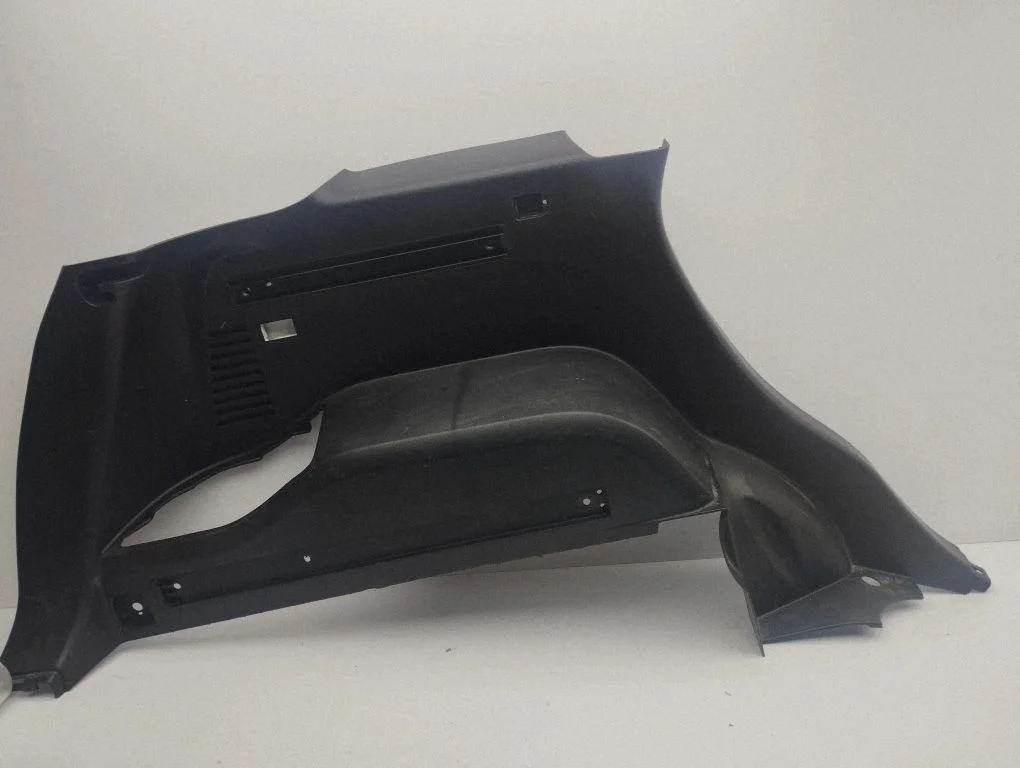 Trunk/boot side trim panel – left