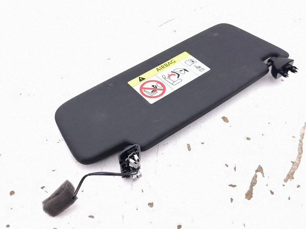 Sun visor – left