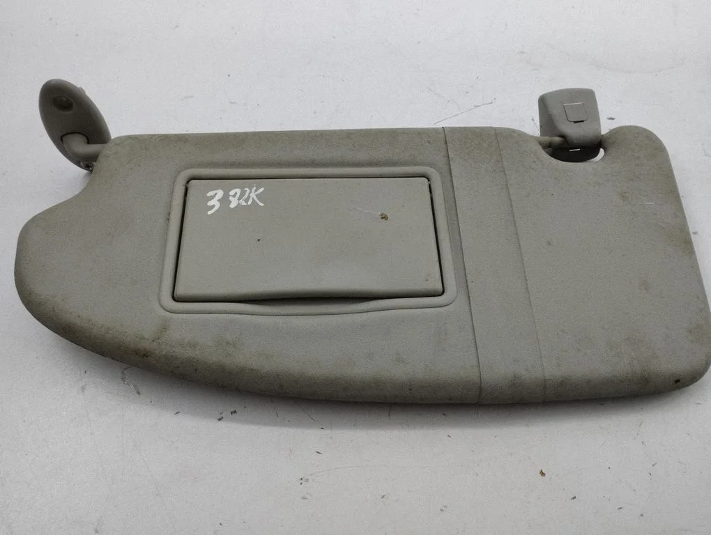 Sun visor – left