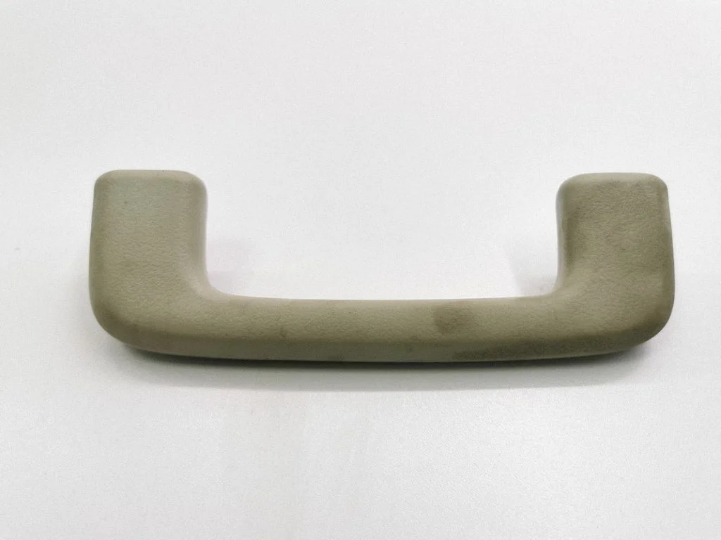 Rear interior roof grab handle – left