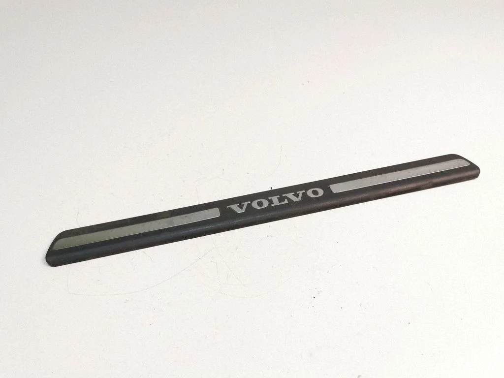 Front sill trim cover 8659960