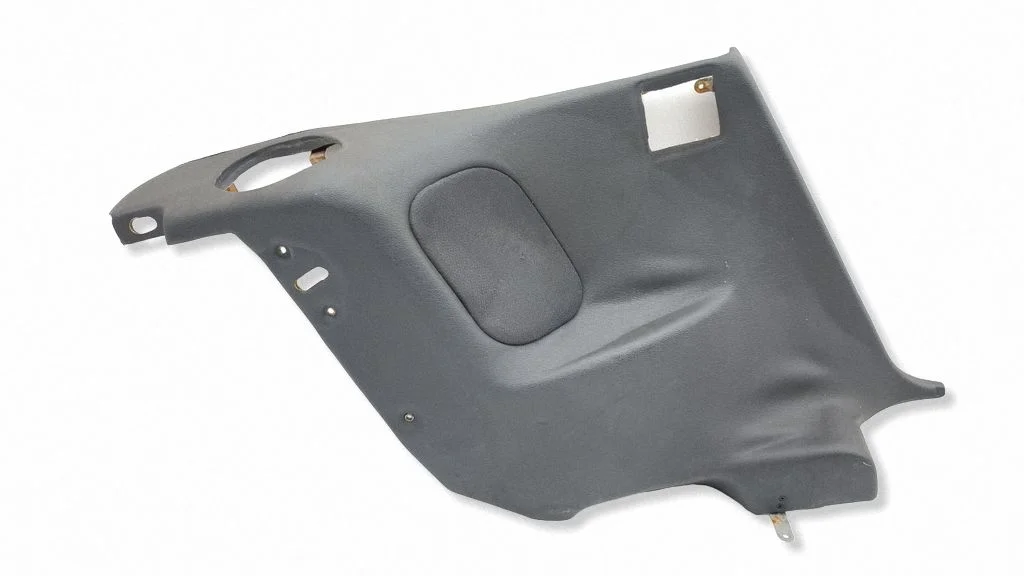 Rear seat side bottom trim – left
