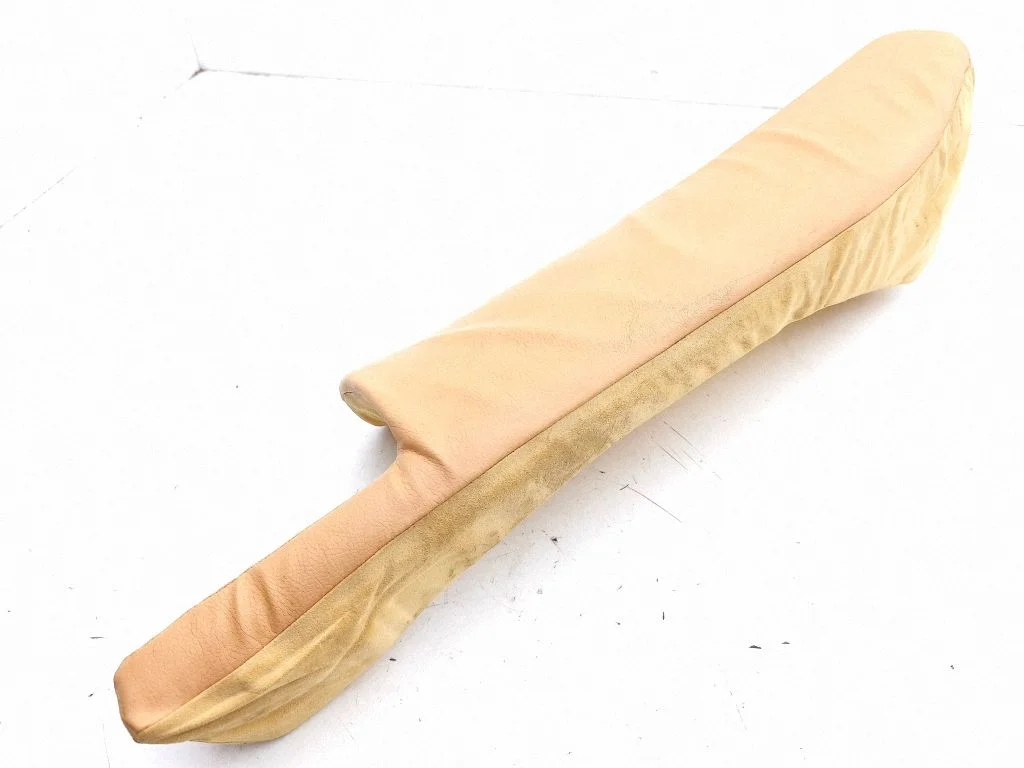 Rear seat side bottom trim – left