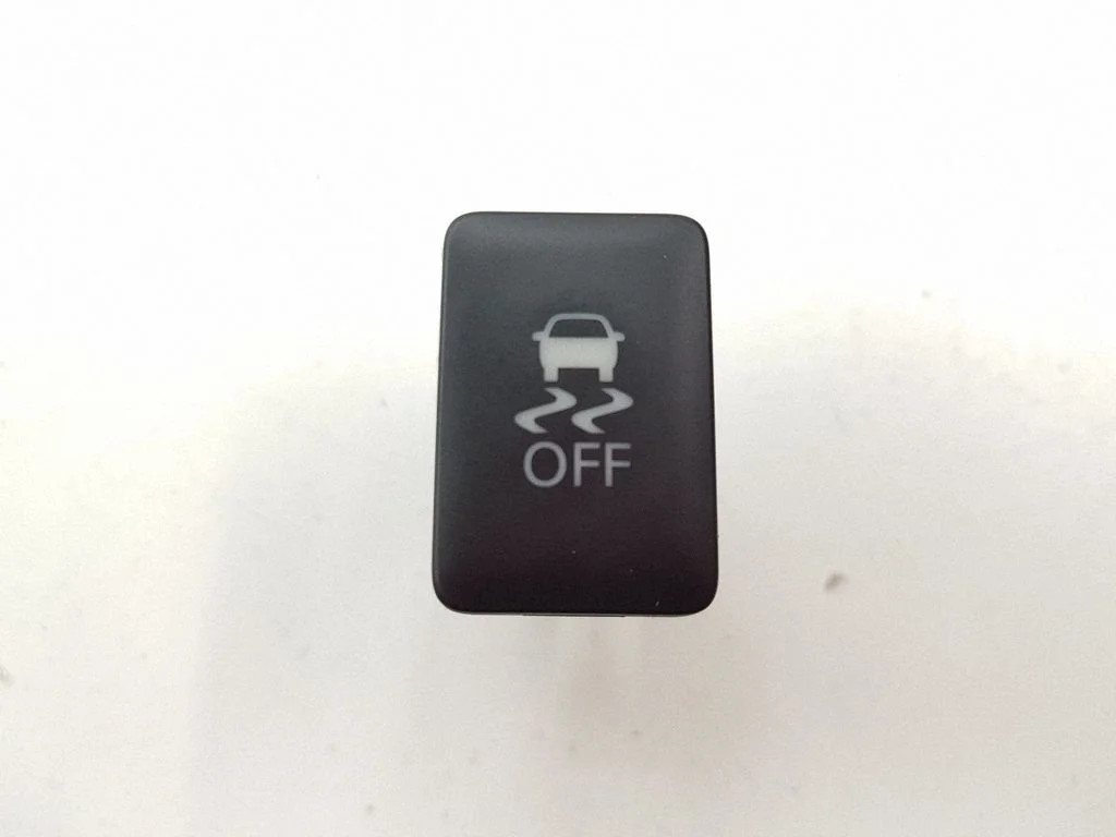 Traction control (ASR) switch – Mitsubishi Outlander (2013-2021)