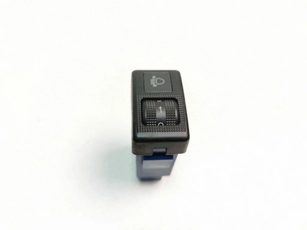 Headlight level height control switch