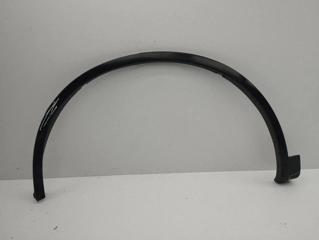 Rear arch trim – left