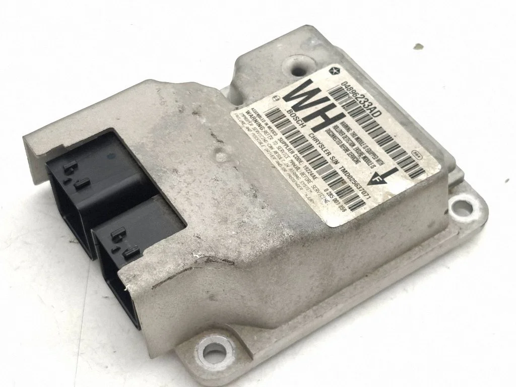 Drošības spilvenu vadības bloks – Jeep Grand Cherokee (WK) (2005-2010)
