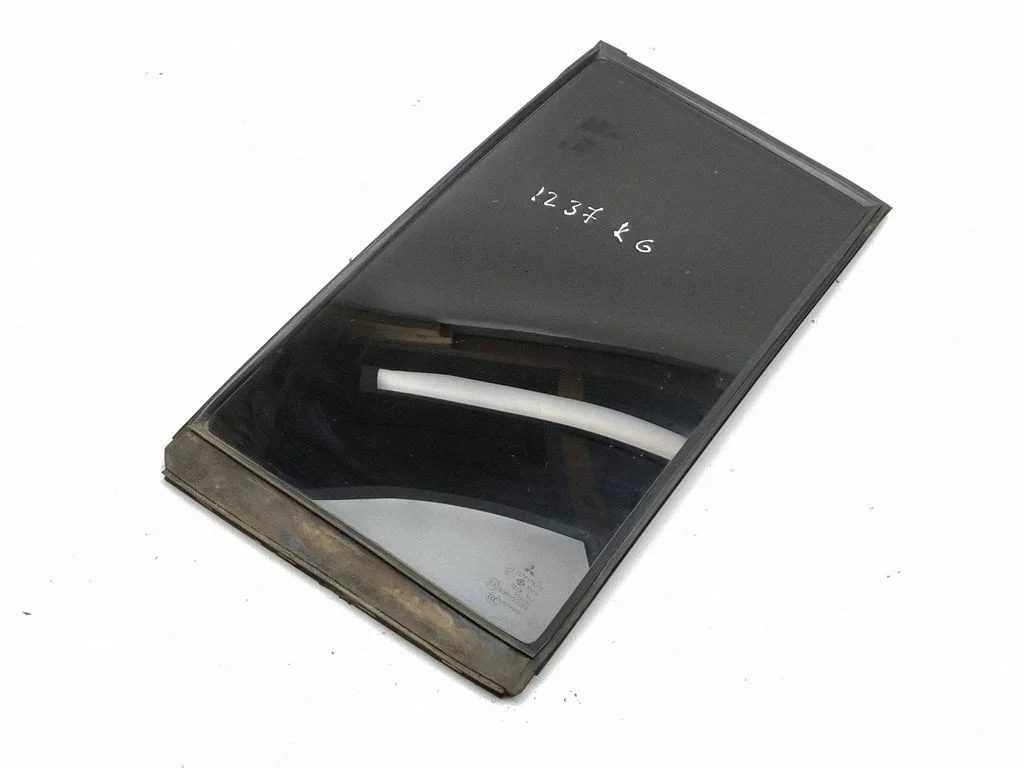 Rear vent window glass – left