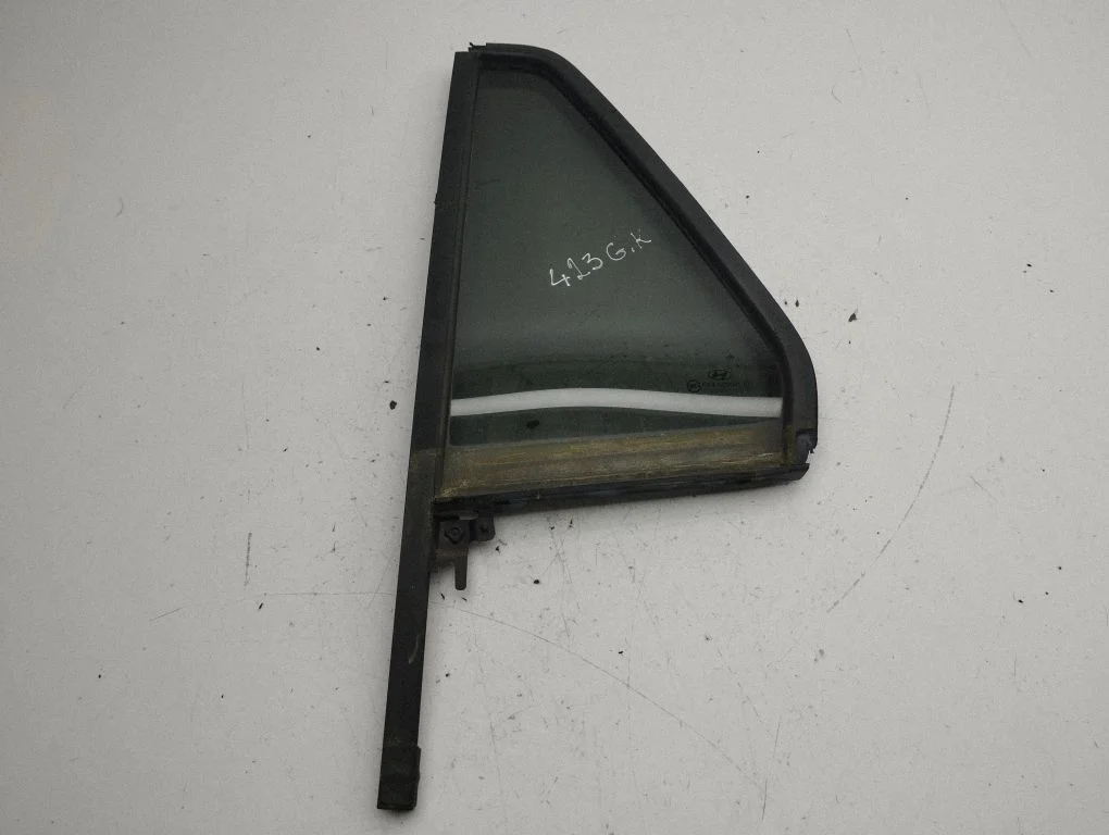 Rear vent window glass – left