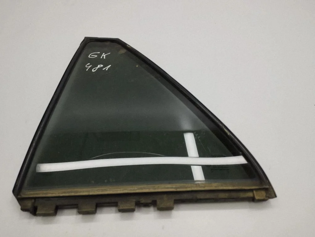 Rear vent window glass – left