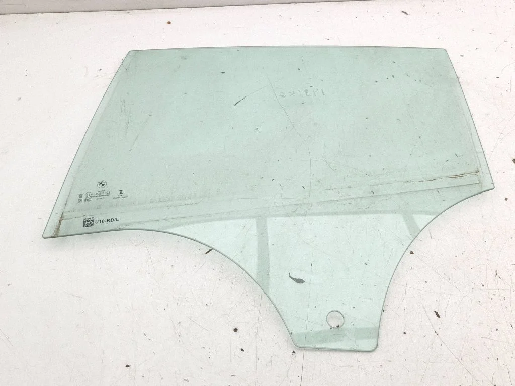 Rear door window glass – left