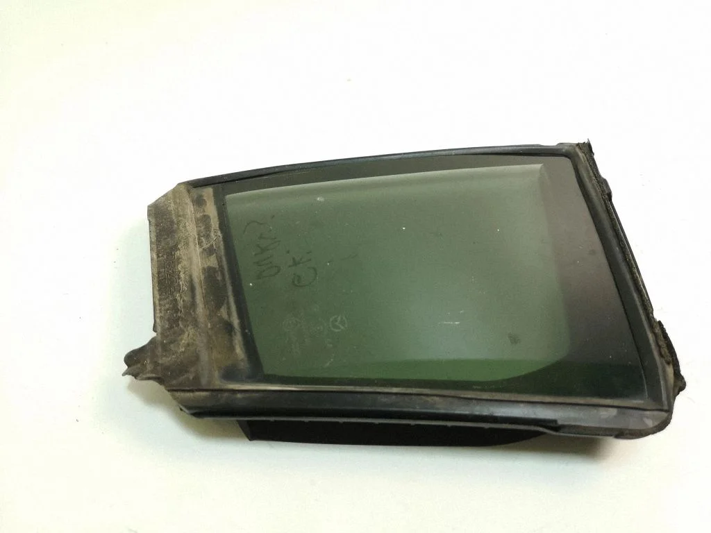 Rear vent window glass – left