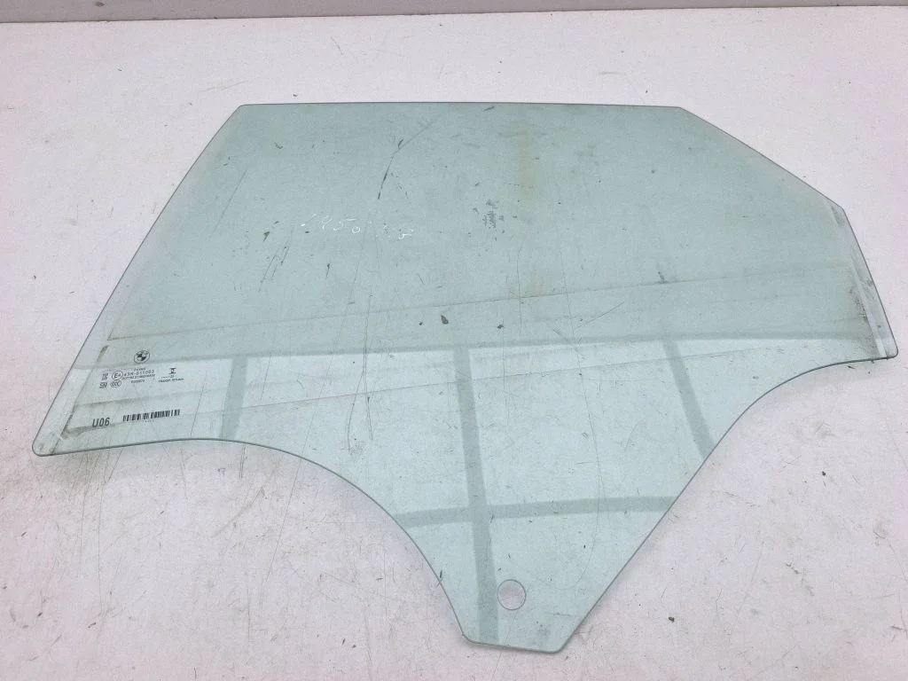 Rear door window glass – left