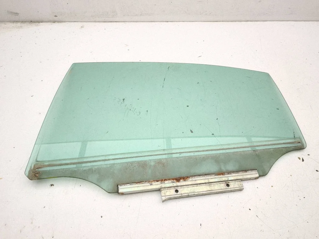 Rear door window glass – left