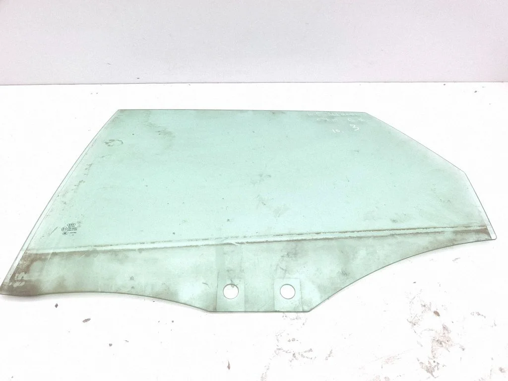Rear door window glass – left