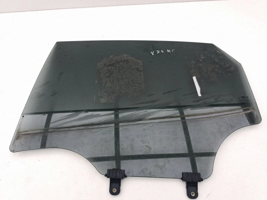 Rear door window glass – left